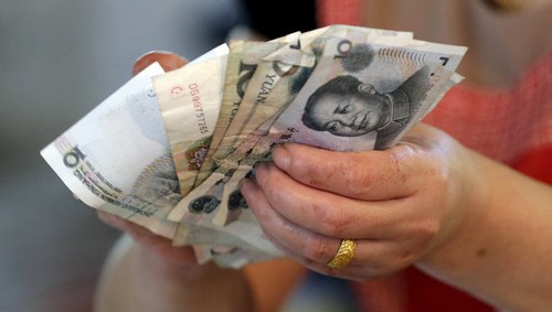 Китай продолжает регулировать курс юаня - ảnh 1